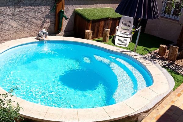 Nacre – Piscine ronde compacte et design